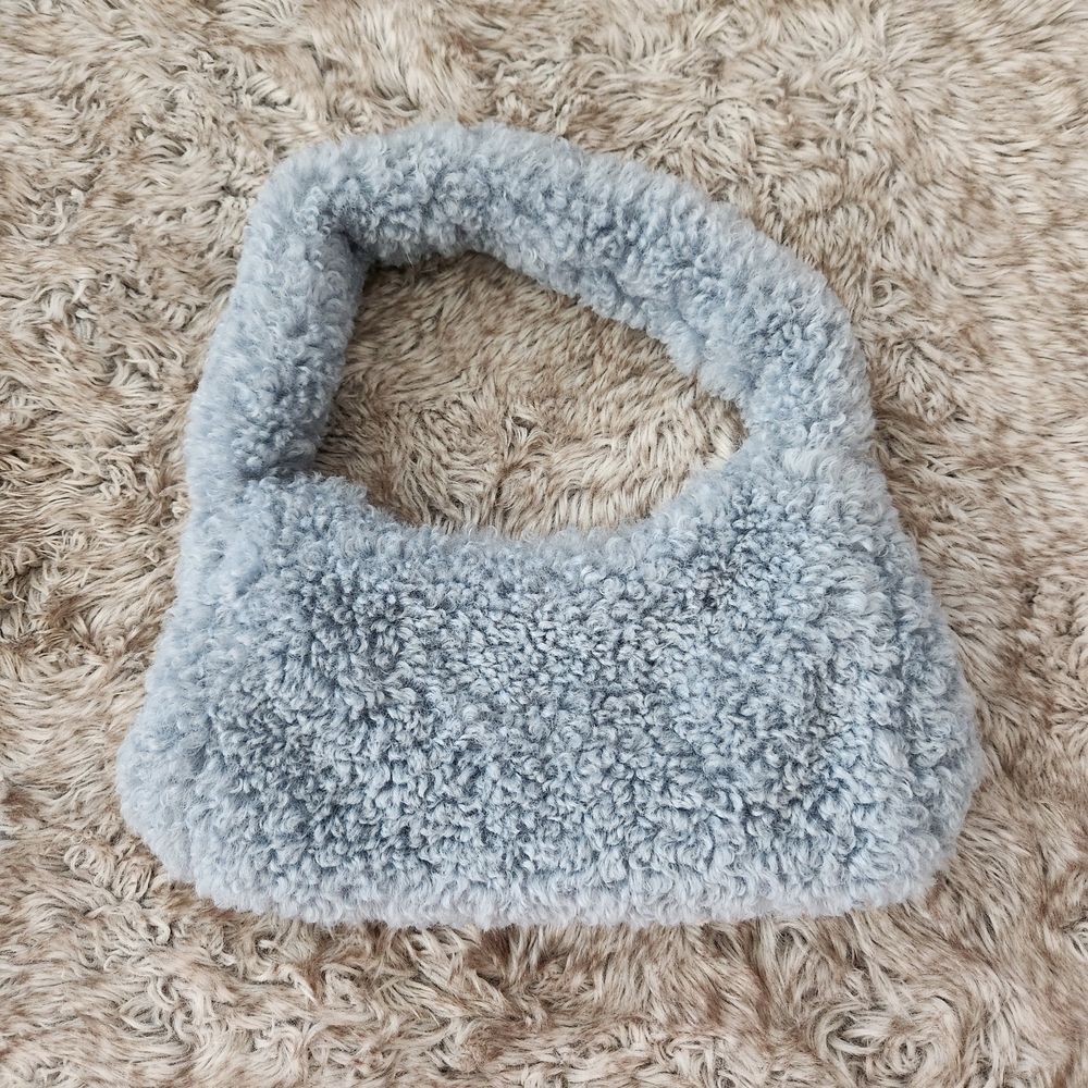 ASOS Design Curved 90s Shoulder Bag in Blue Faux Fur Sherpa